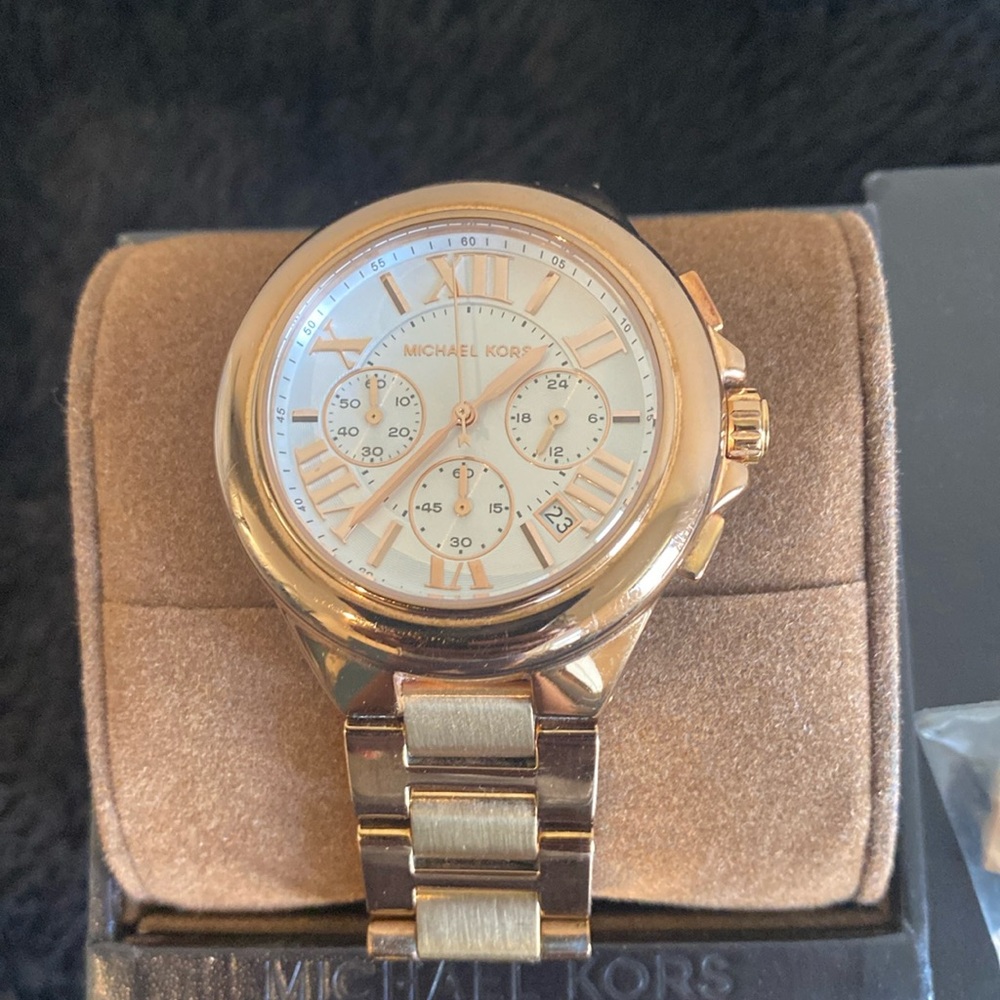 Michael Kors Rose gold chronograph watch.